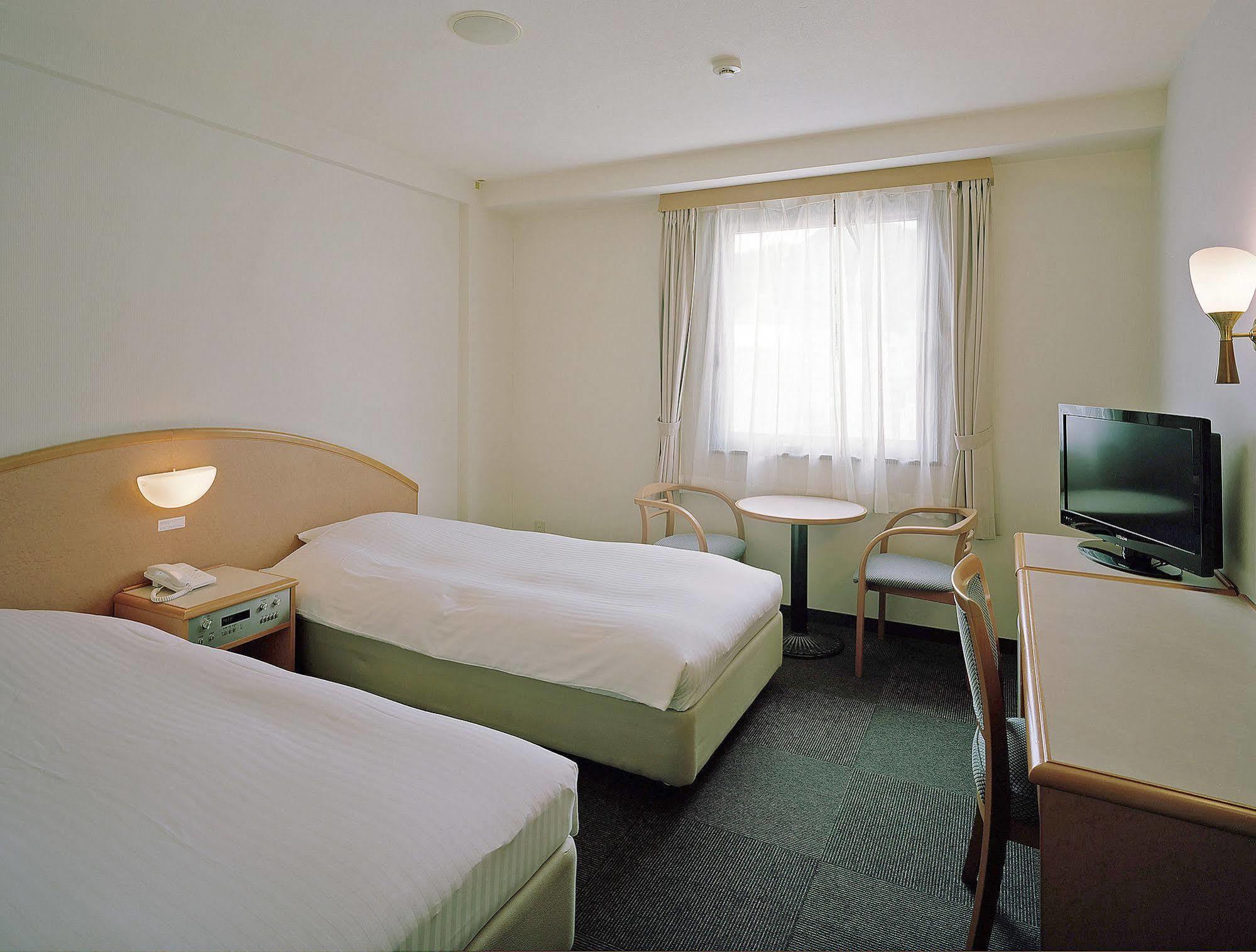 Hotel New Amami Exterior photo
